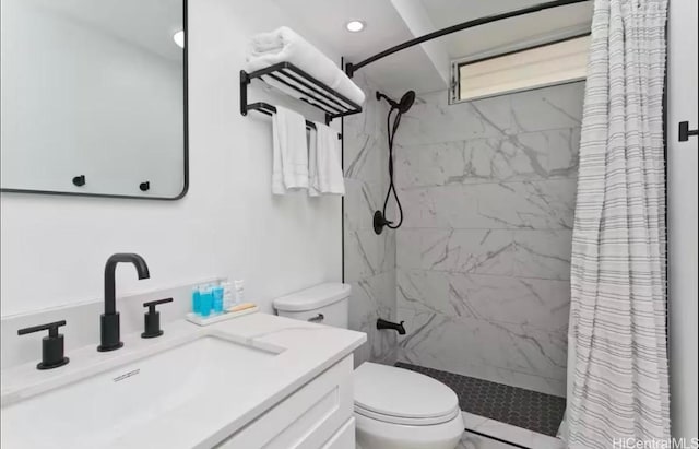 bathroom featuring vanity, toilet, recessed lighting, and a stall shower