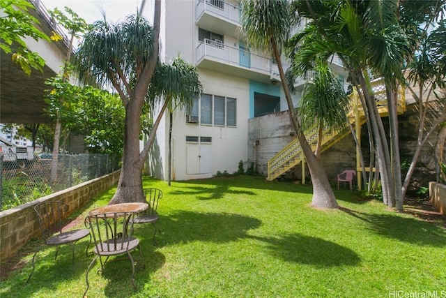 2873 S King St Unit 203, Honolulu, HI 96826 - view of yard with stairs and fence
