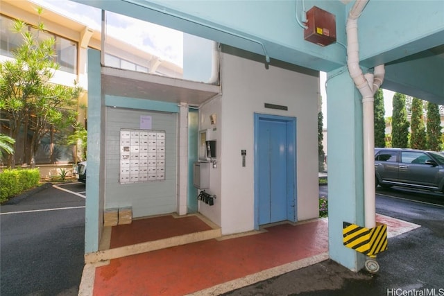 2873 S King St Unit 203, Honolulu, HI 96826 - exterior space featuring stucco siding and elevator