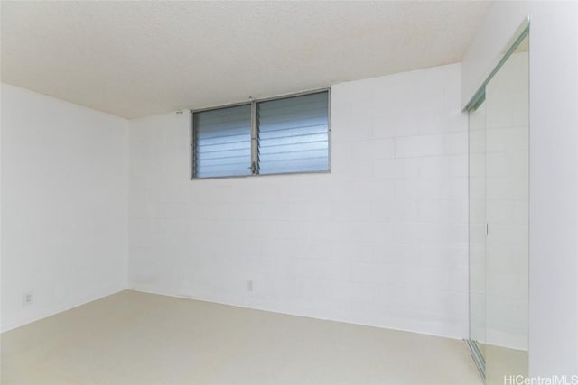 2873 S King St Unit 203, Honolulu, HI 96826 - unfurnished room featuring a textured ceiling