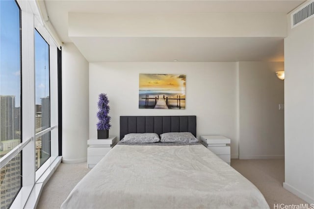 1288 Kapiolani Blvd Unit I-4203, Honolulu, HI 96814 - bedroom with baseboards, visible vents, and carpet