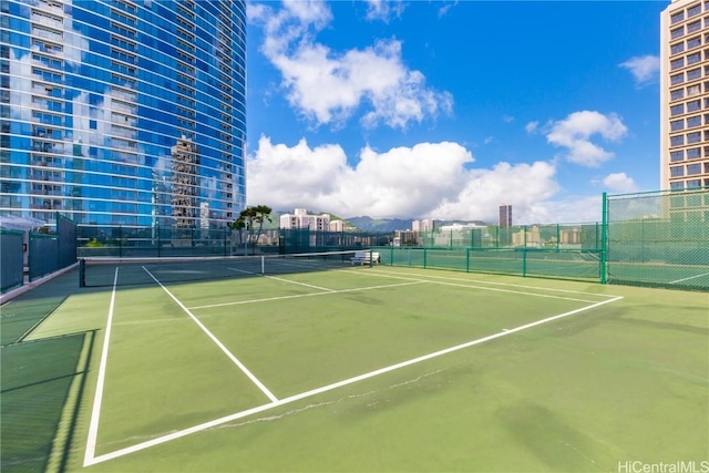 1288 Kapiolani Blvd Unit I-4203, Honolulu, HI 96814 - view of sport court featuring fence