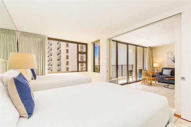 201 Ohua Ave Unit 908, Honolulu, HI 96815 - tiled bedroom with access to exterior