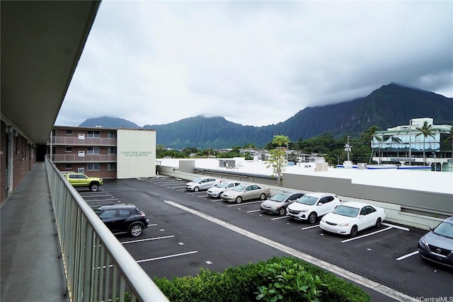 uncovered parking lot with a mountain view