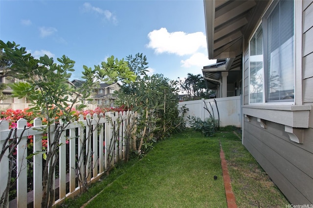 view of yard with a fenced backyard
