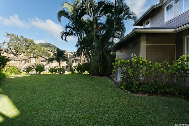 view of yard featuring a residential view