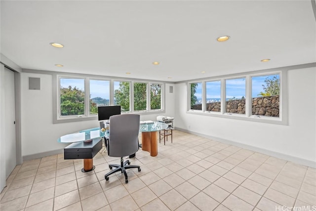 office featuring light tile patterned flooring, baseboards, and recessed lighting