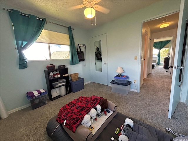 94-203 Paioa Pl Unit P201, Waipahu, HI 96797 - living room with carpet flooring, ceiling fan, and a textured ceiling