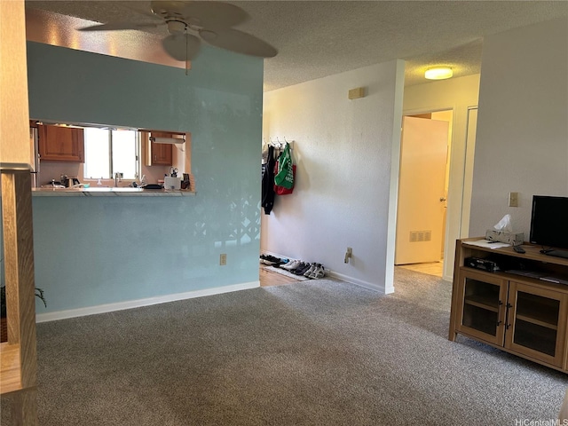 94-203 Paioa Pl Unit P201, Waipahu, HI 96797 - living room with carpet, a ceiling fan, and a textured ceiling