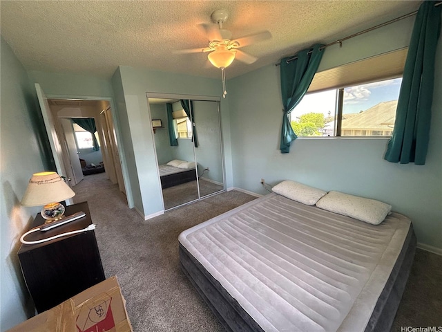 94-203 Paioa Pl Unit P201, Waipahu, HI 96797 - carpeted bedroom with multiple windows, a textured ceiling, a closet, and ceiling fan