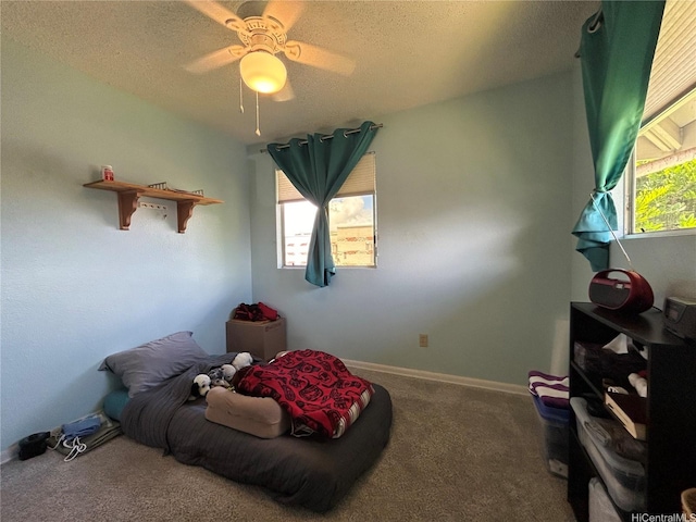 94-203 Paioa Pl Unit P201, Waipahu, HI 96797 - bedroom with carpet flooring, a textured ceiling, and ceiling fan