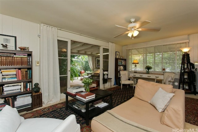 living room featuring a ceiling fan