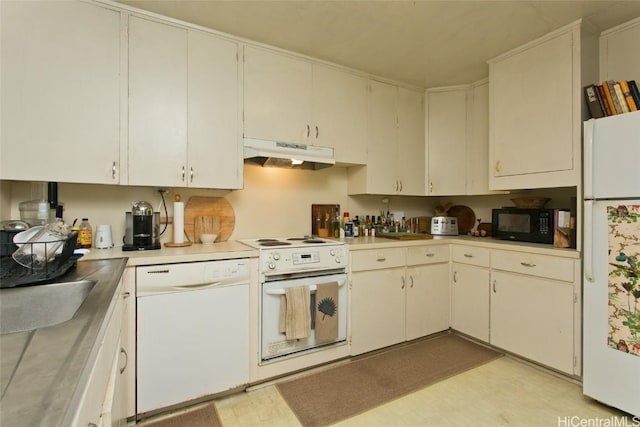kitchen featuring light countertops, white appliances, light floors, under cabinet range hood, and a sink