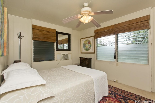 carpeted bedroom with cooling unit and ceiling fan