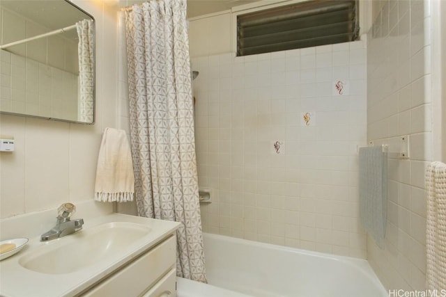 full bath featuring shower / bath combo and vanity