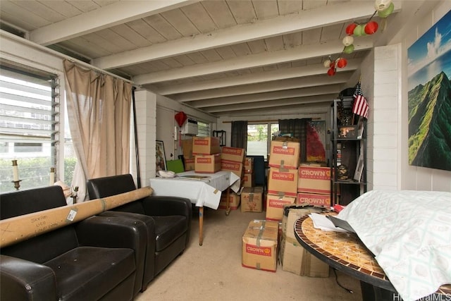 bedroom with beamed ceiling and wood ceiling