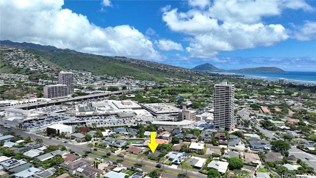 aerial view with a view of city and a water and mountain view