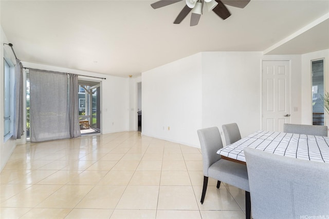 91-1058 Kekuilani Loop Unit 1701, Kapolei, HI 96707 - dining space with light tile patterned flooring and ceiling fan