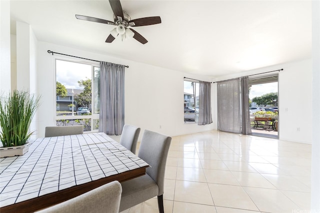 91-1058 Kekuilani Loop Unit 1701, Kapolei, HI 96707 - dining area with light tile patterned floors and ceiling fan