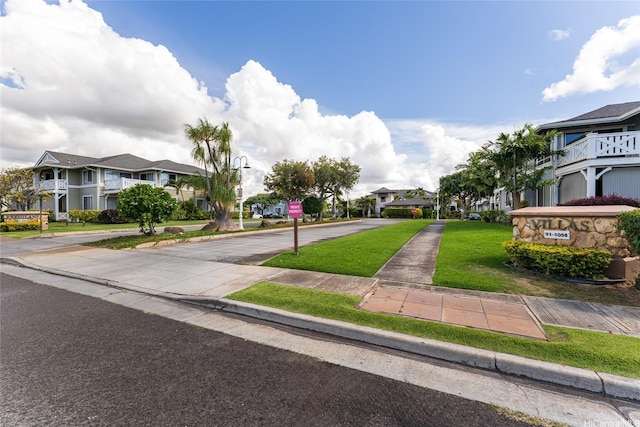 91-1058 Kekuilani Loop Unit 1701, Kapolei, HI 96707 - view of street with curbs, sidewalks, a residential view, and street lights