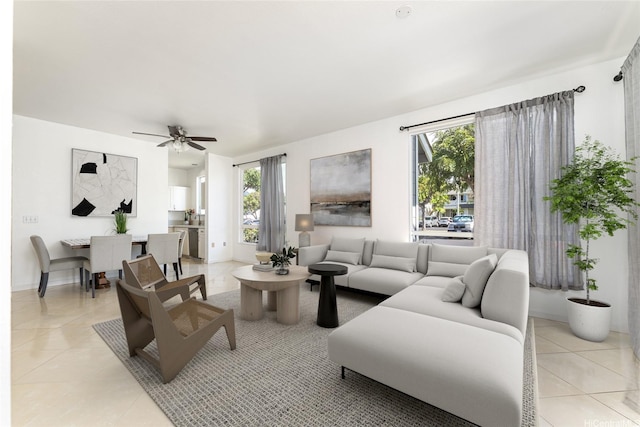 91-1058 Kekuilani Loop Unit 1701, Kapolei, HI 96707 - living room featuring light tile patterned flooring, a healthy amount of sunlight, and ceiling fan