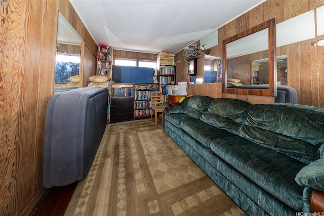 living area with wood walls