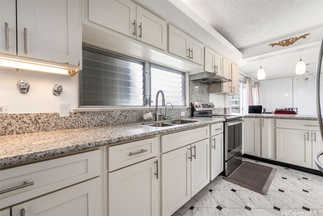 2421 Ala Wai Blvd Unit Ph1, Honolulu, HI 96815 - kitchen featuring under cabinet range hood, hanging light fixtures, electric range, a textured ceiling, and a sink