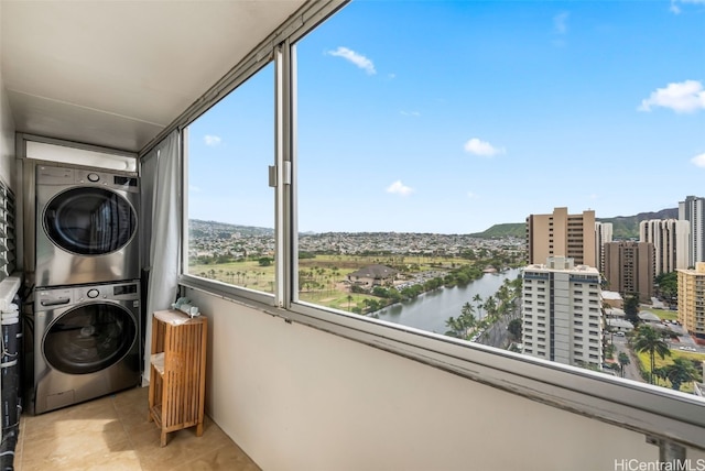 2421 Ala Wai Blvd Unit Ph1, Honolulu, HI 96815 - washroom featuring laundry area, stacked washer / dryer, and a water view