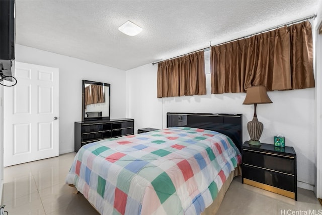 2421 Ala Wai Blvd Unit Ph1, Honolulu, HI 96815 - bedroom featuring a textured ceiling