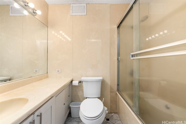 2421 Ala Wai Blvd Unit Ph1, Honolulu, HI 96815 - bathroom featuring combined bath / shower with glass door, visible vents, toilet, and vanity