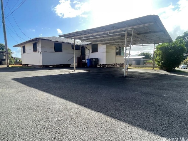 1363 California Ave, Wahiawa, HI 96786 - view of vehicle parking with a carport and driveway