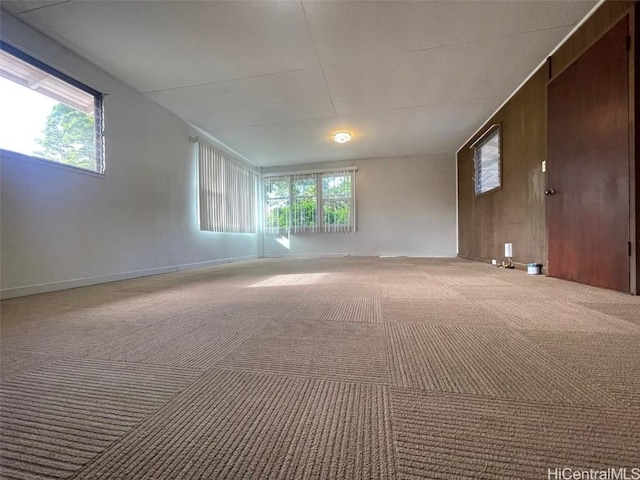 1363 California Ave, Wahiawa, HI 96786 - carpeted empty room with plenty of natural light and baseboards