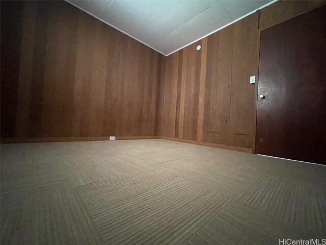 1363 California Ave, Wahiawa, HI 96786 - unfurnished room featuring vaulted ceiling and wooden walls