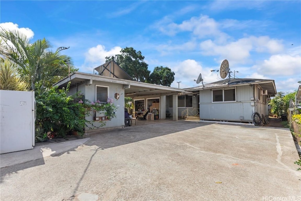 1404 Noelani St, Pearl City, HI 96782 - view of front of house featuring a carport