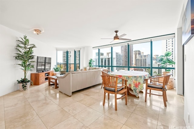 1888 Kalakaua Ave Unit 1705, Honolulu, HI 96815 - dining room with ceiling fan, light tile patterned floors, and expansive windows