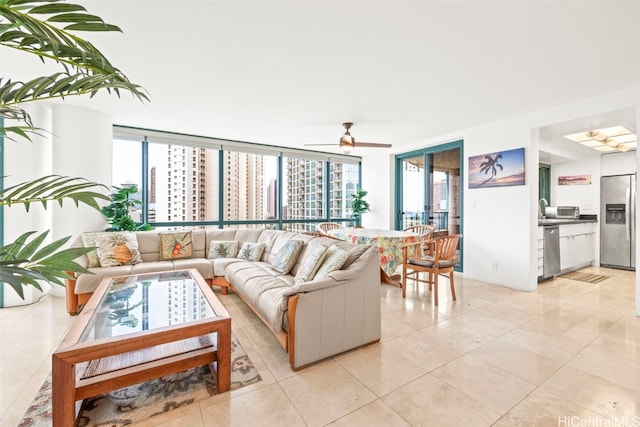1888 Kalakaua Ave Unit 1705, Honolulu, HI 96815 - living area featuring a ceiling fan and light tile patterned flooring