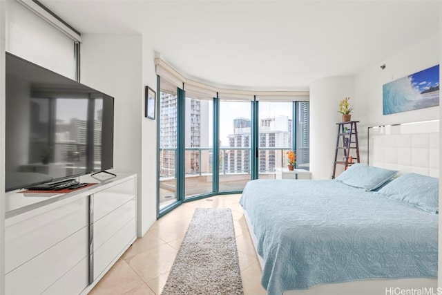 1888 Kalakaua Ave Unit 1705, Honolulu, HI 96815 - bedroom with light tile patterned flooring, expansive windows, and access to exterior