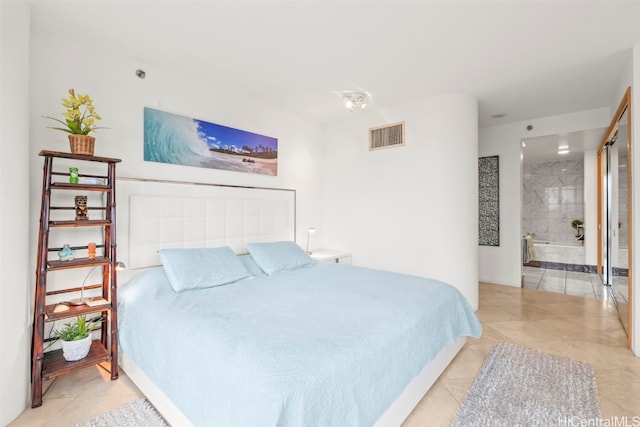 1888 Kalakaua Ave Unit 1705, Honolulu, HI 96815 - bedroom with tile patterned floors and connected bathroom