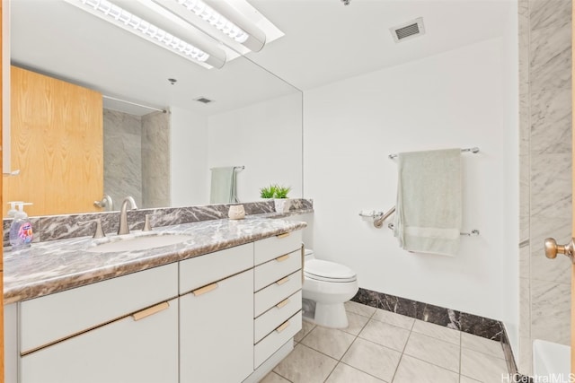 1888 Kalakaua Ave Unit 1705, Honolulu, HI 96815 - bathroom with toilet, vanity, tile patterned flooring, a shower, and baseboards