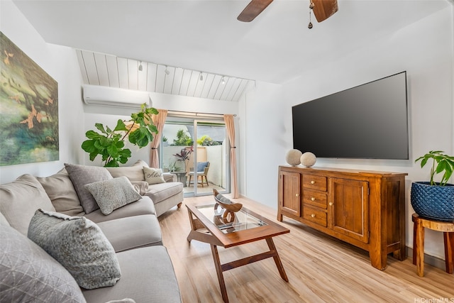 553 Pepeekeo St Unit 6, Honolulu, HI 96825 - living room with an AC wall unit, light wood-style floors, and ceiling fan