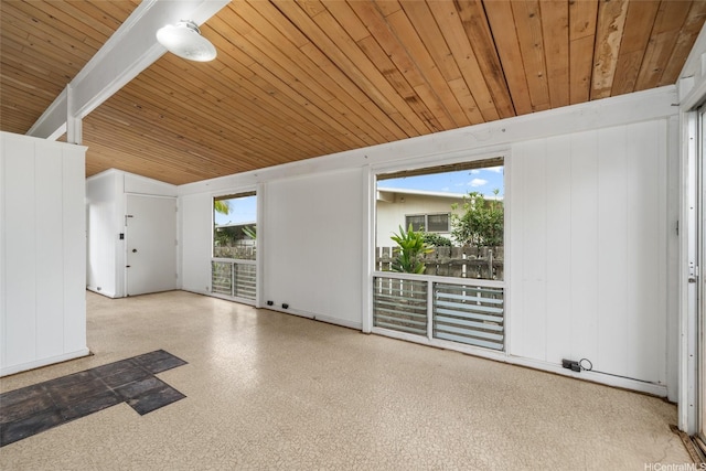 unfurnished living room with wooden ceiling