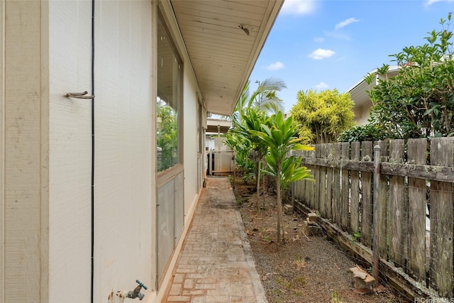 view of side of property with fence private yard