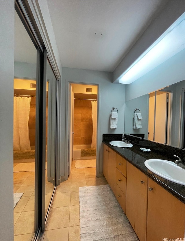 6770 Hawaii Kai Dr Unit 409, Honolulu, HI 96825 - bathroom with curtained shower, tile patterned flooring, double vanity, and a tub