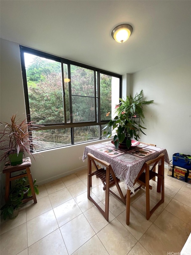 6770 Hawaii Kai Dr Unit 409, Honolulu, HI 96825 - dining area featuring healthy amount of natural light and light tile patterned floors