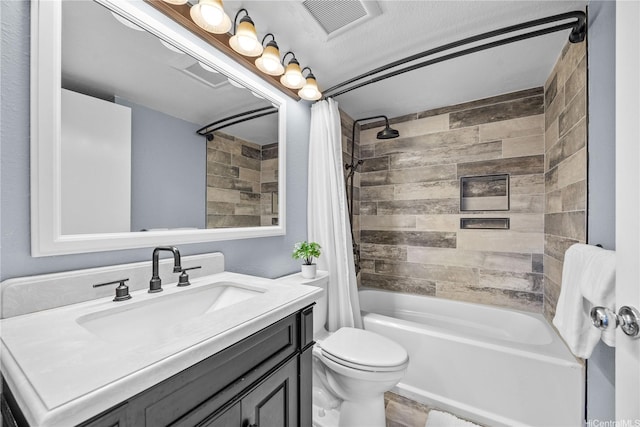 bathroom with shower / bath combo with shower curtain, toilet, and vanity