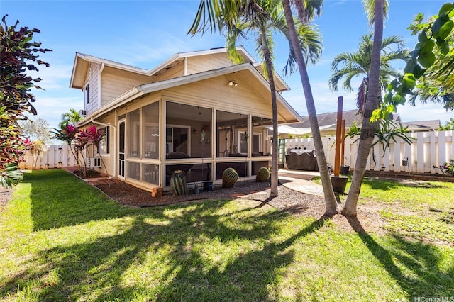 91-839 Laupai Pl, Ewa Beach, HI 96706 - rear view of property featuring a sunroom