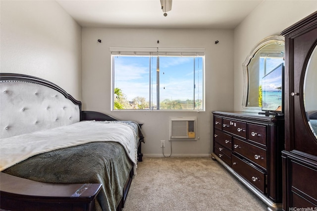 bedroom featuring baseboards, light colored carpet, and multiple windows