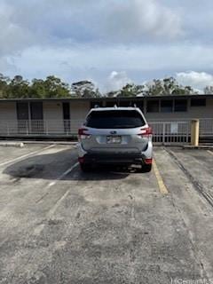 view of uncovered parking lot