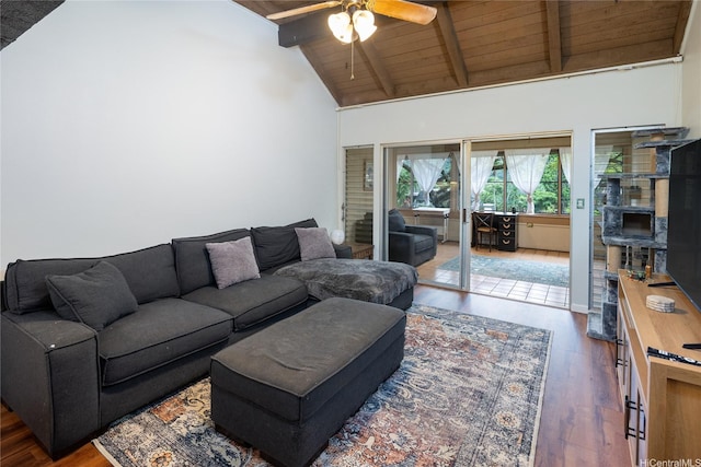 living area featuring a ceiling fan, beam ceiling, wood finished floors, wooden ceiling, and high vaulted ceiling