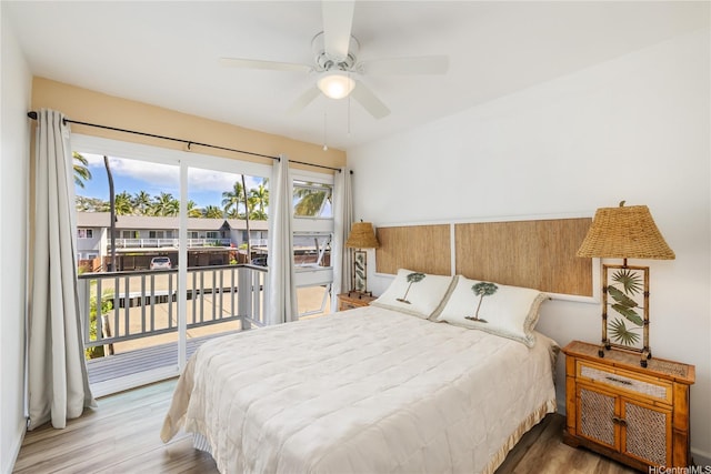 215 Koko Isle Cir Unit 5502, Honolulu, HI 96825 - bedroom featuring access to exterior, wood finished floors, and ceiling fan